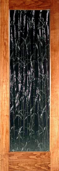Lively textured glass features bamboo shoots.  Shown here in a stained pine wood door frame.